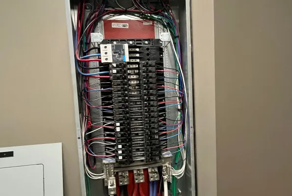 Open electrical panel checked for EV charger capacity in Canton, GA by Innovative Electrical Systems